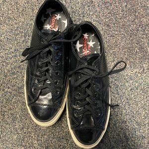 Black women’s shiny converse